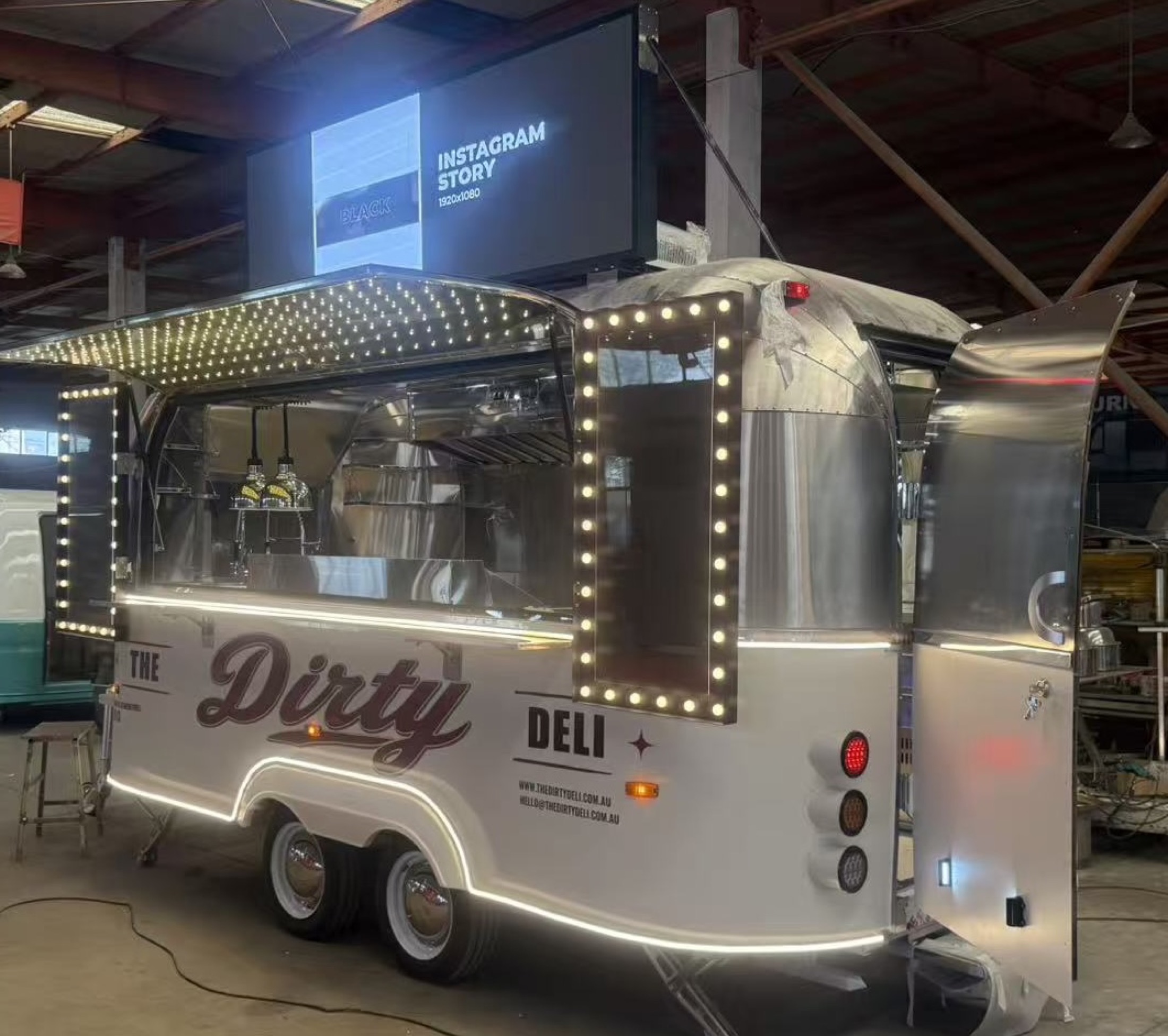 Dirty Deli branding and illuminated serving hatch