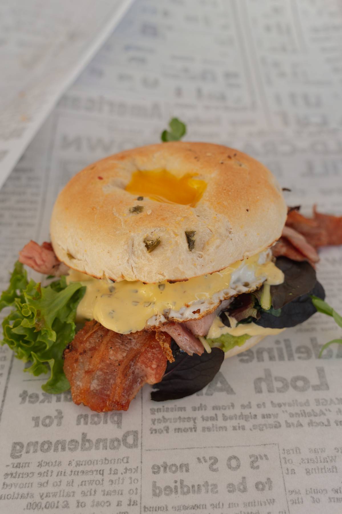 The Benny bagel, pictured with optional bacon